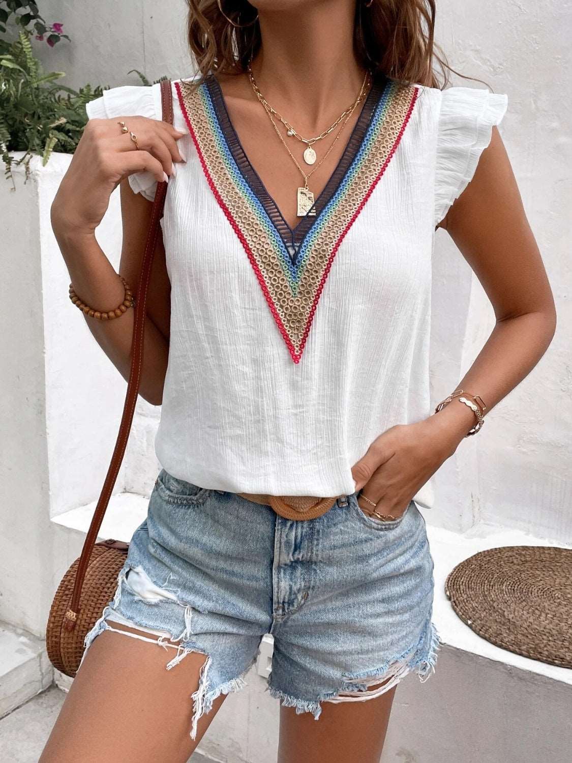 A Ruffled V-Neck Cap Sleeve Blouse